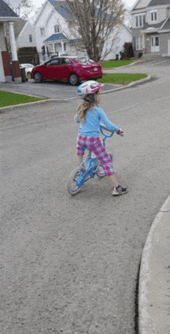 Caption : My daughter with DCD trying to learn to ride a bike