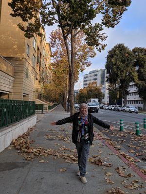 Caption: A photo of Nyai on a street in San Jose.