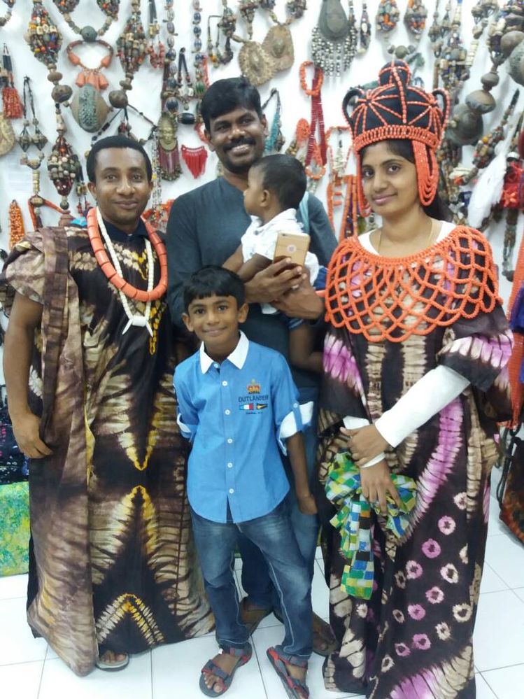 Emeka and some visitors in Nigeria attire