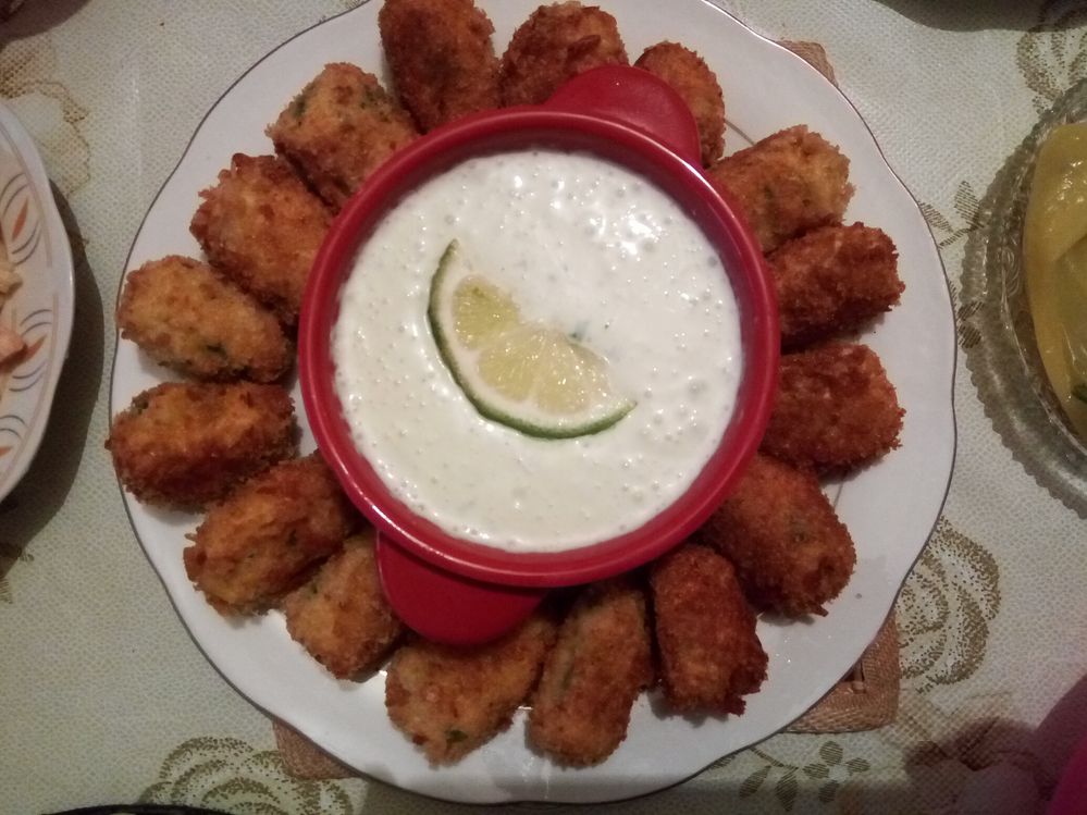 Sfiriya with cheese garlic sauce