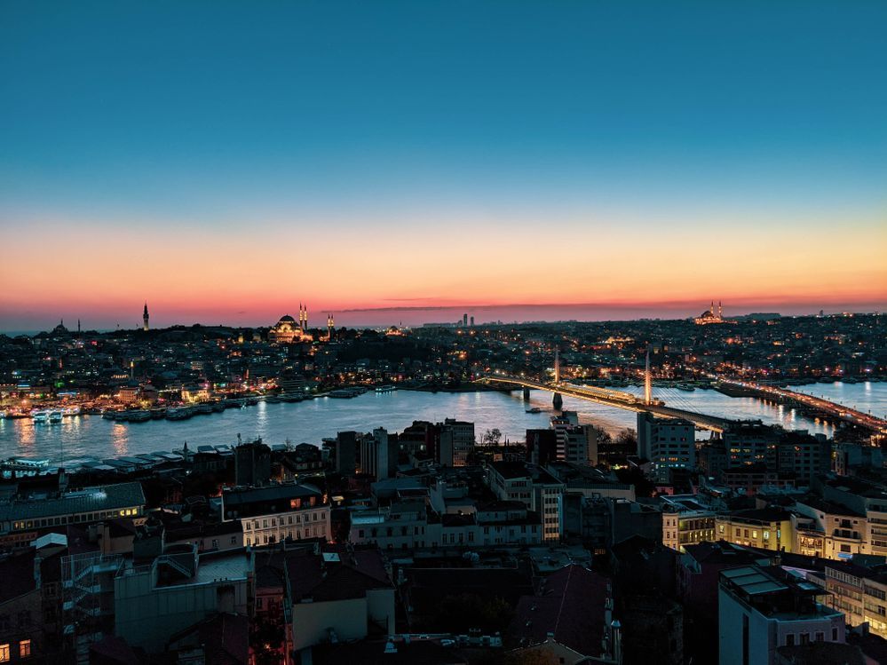 Caption: A photo of the Istanbul cityscape after sunset as seen from the Galata Tower. (Local Guide @StephenLammens)