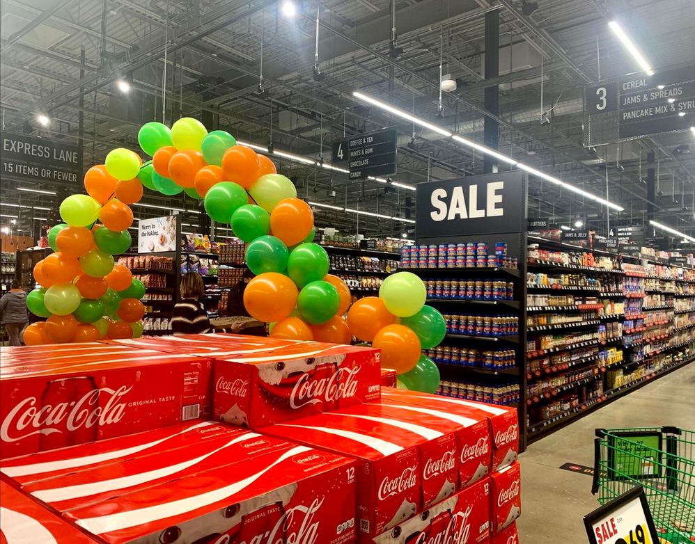 Amazon Fresh Store decorated with colorful balloons.