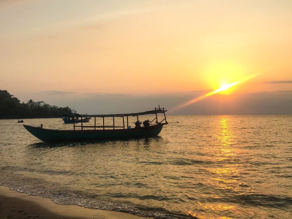 Sunset over the sea and boat at Koh Tonsai. Watching for sunset at the sea is one of the best feeling ever!