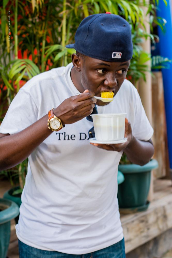 Eating Zanzibar Mix. PPhoto by Daniel Msirikale