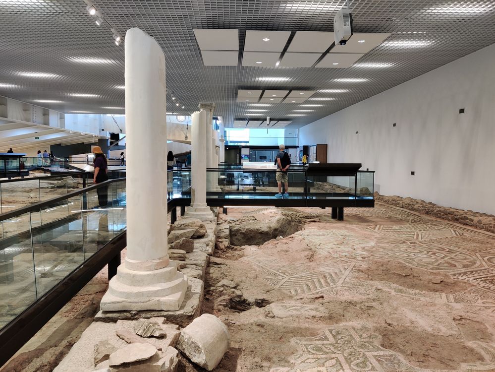 Caption: A photo inside the Bishop’s Basilica of Philippopolis showing some of the mosaics, ancient columns, and accessible modern walking platforms. (Local Guide @DeniGu)