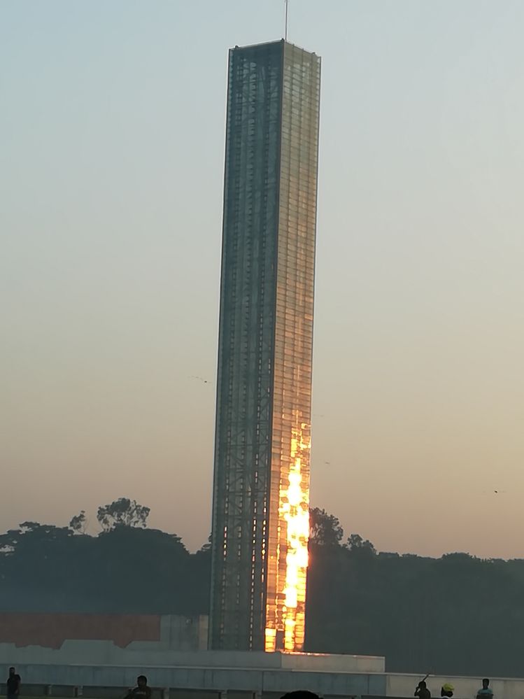 Rising sun's light on Glass Tower,  Sohrawardi Uddyan  park, Dhaka