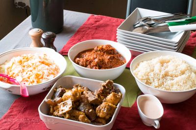 Boiled Rice, Stew, Plantain Porridge and cole slaw