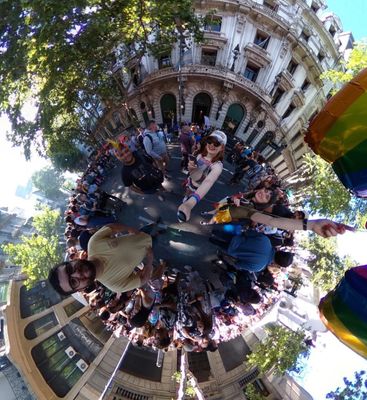 Caption: 360 photo of me, my friend, and Local Guides @AdroGran and @Maximilianozalazar, smiling in Avenue de Mayo during the pride parade.