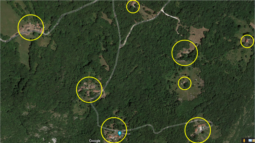 Caption: a screen of Google Maps, in which we see, highlighted within circles, small villages and groups of houses in a mountainous area. Until a week ago the road that connects them was not in Google Maps.