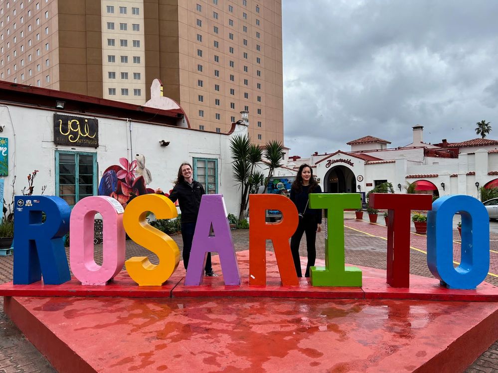 My partner & I posing behind the Rosarito letters