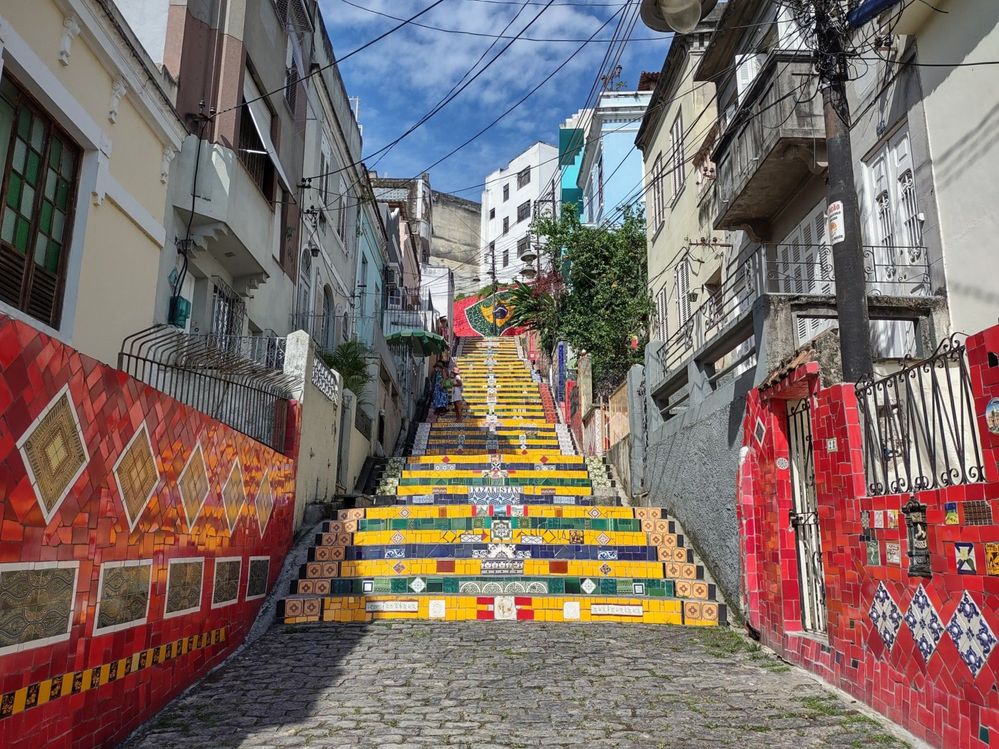 Caption: A photo of the Escadaria Selarón stairs covered with colorful mosaics. (Local Guide Paulo Melchior)