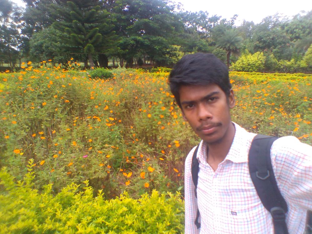 A selfie with colourful flowers..