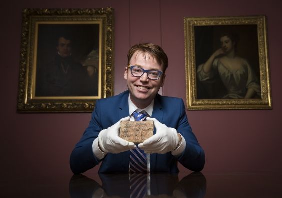 Caption: Dr Daniel Mansfield with the Plimpton 322 Babylonian clay tablet in the Rare Book and Manuscript Library at Columbia University in New York. Image: UNSW/Andrew Kelly
