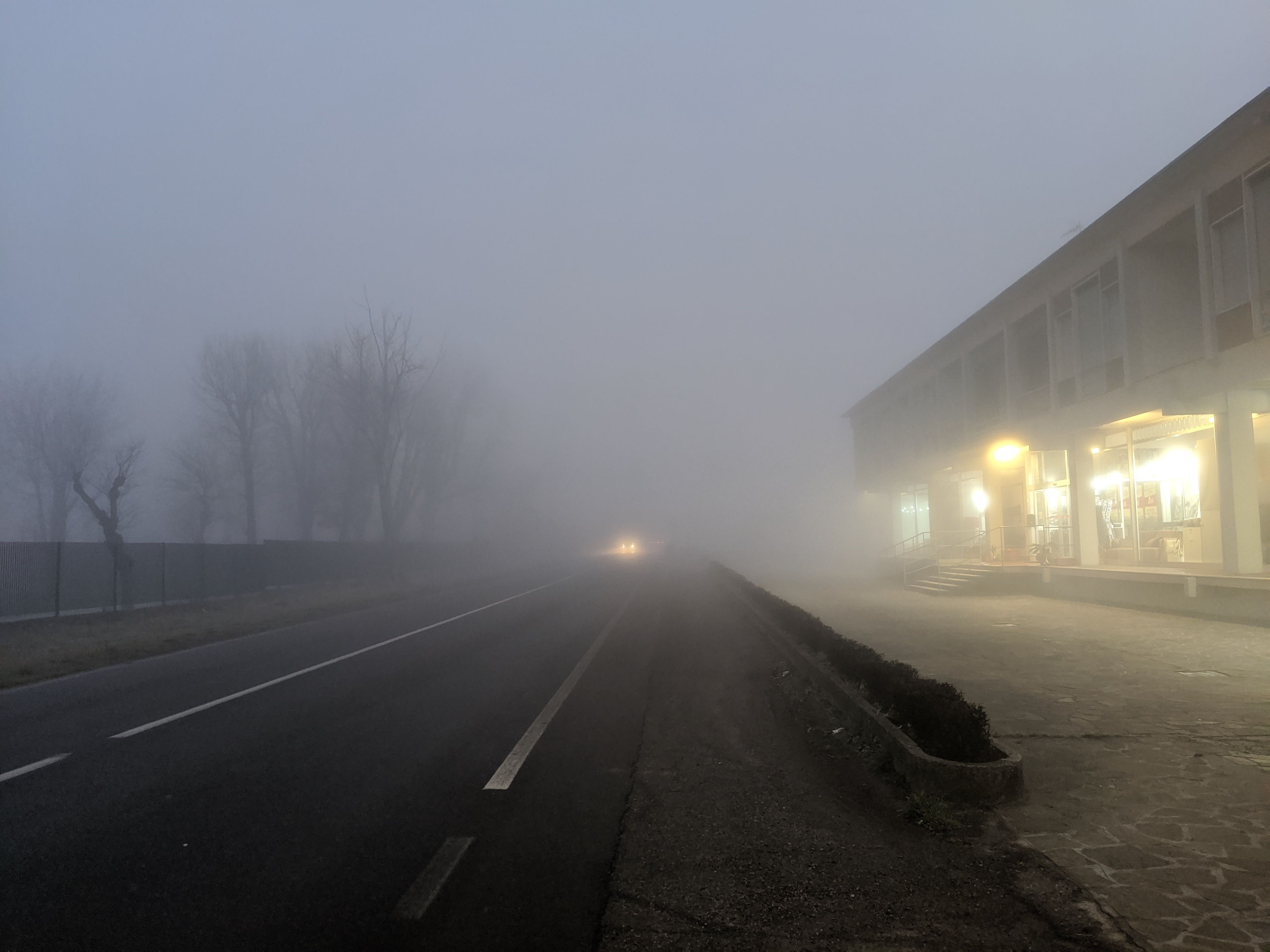 Panorama of a way surrounded by fog