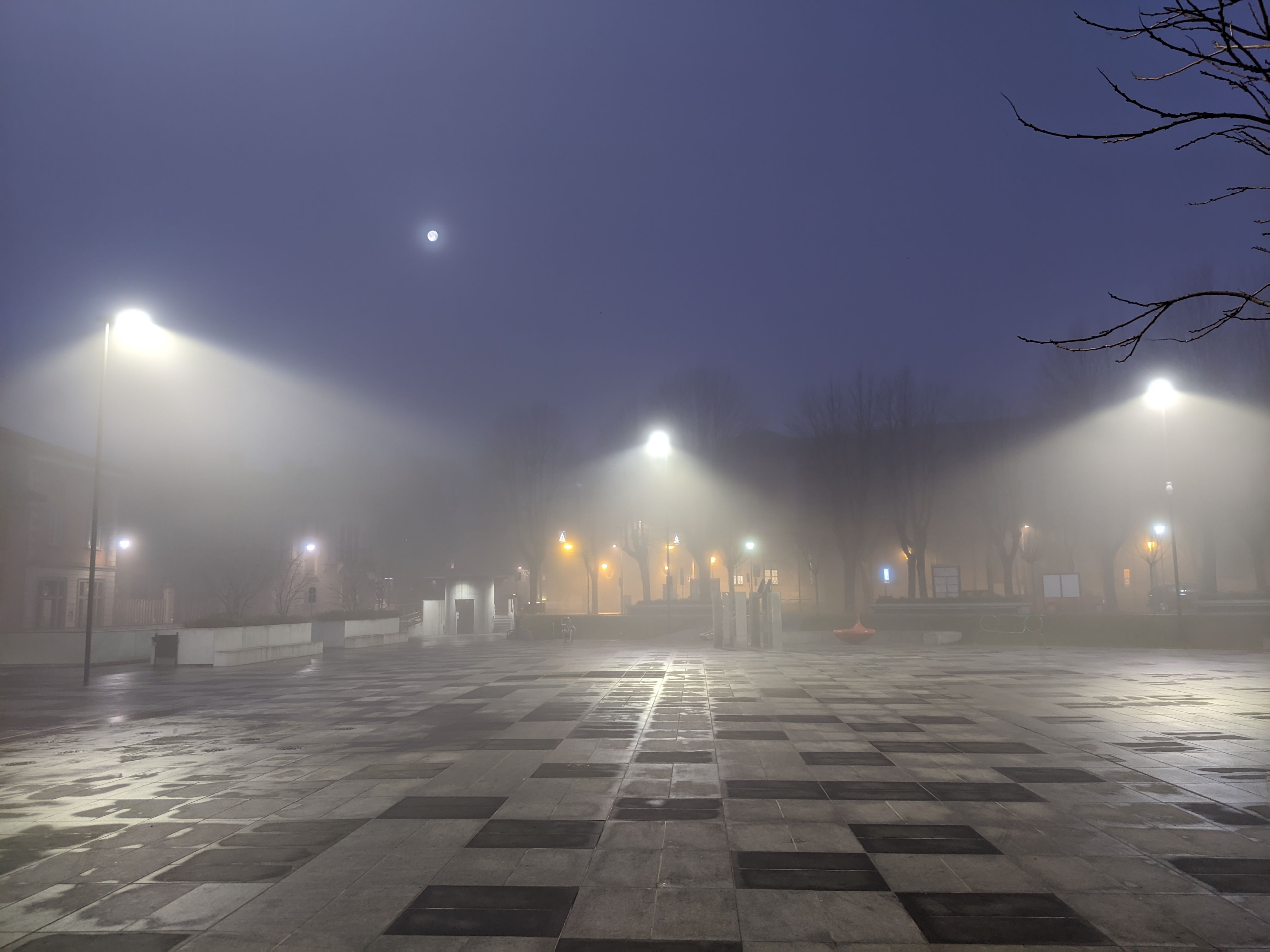 Piazza Setti square in Treviglio surrounded by fog