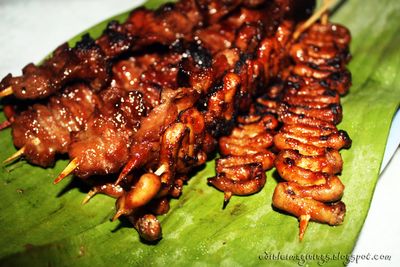 We call it "Isaw" , one of the very famous street foods here in the Philippines. These are chicken's intestines, cleansed and washed thoroughly. It's cook either grilled or fried, and dip it with spicy sauce or tasty ketchup.