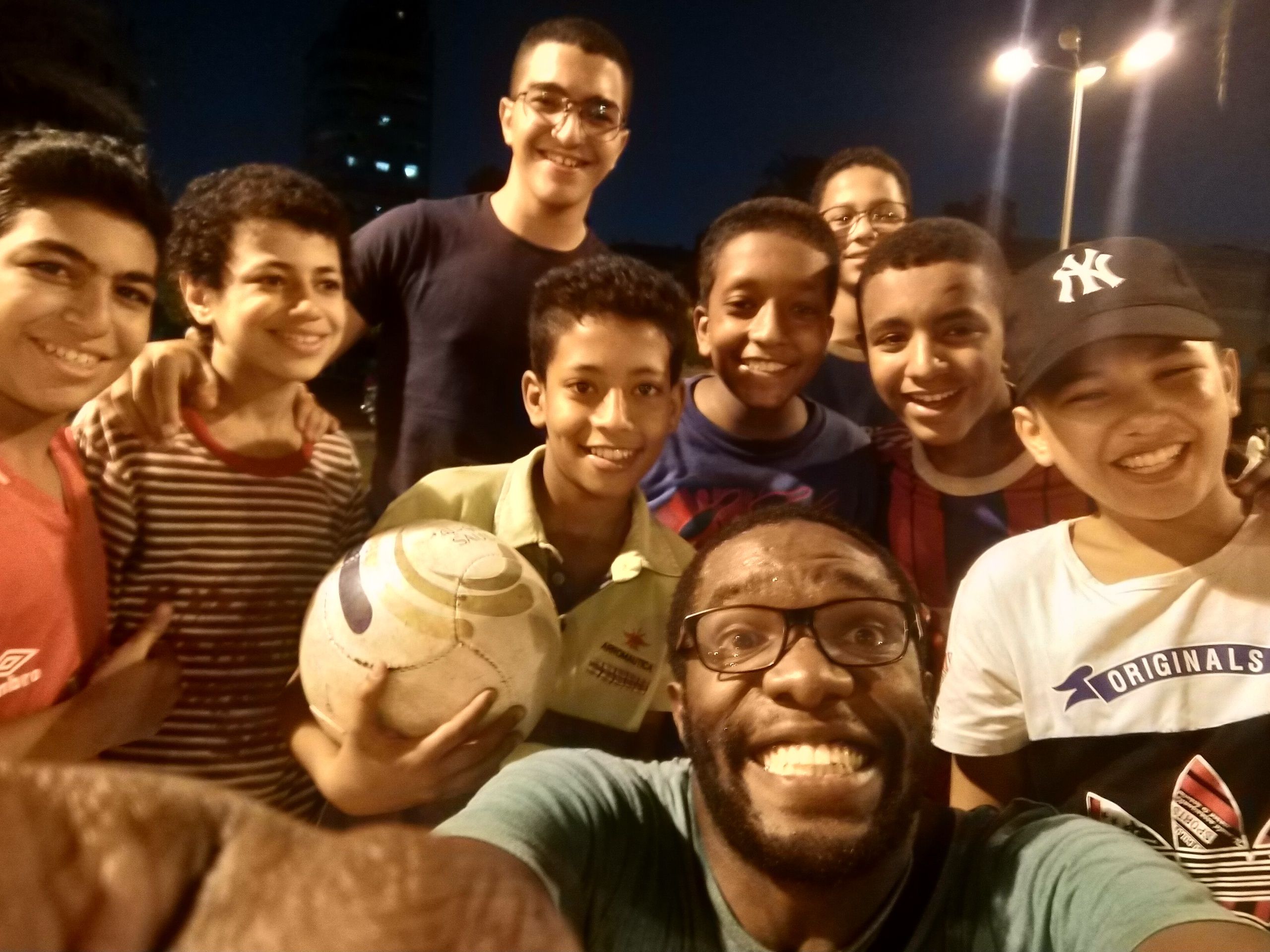 Post football photo photo at the park outside Abdeen Palace Museum. One of the kids wasn't too happy to see me join but at the end, he asked for us to take a group photo