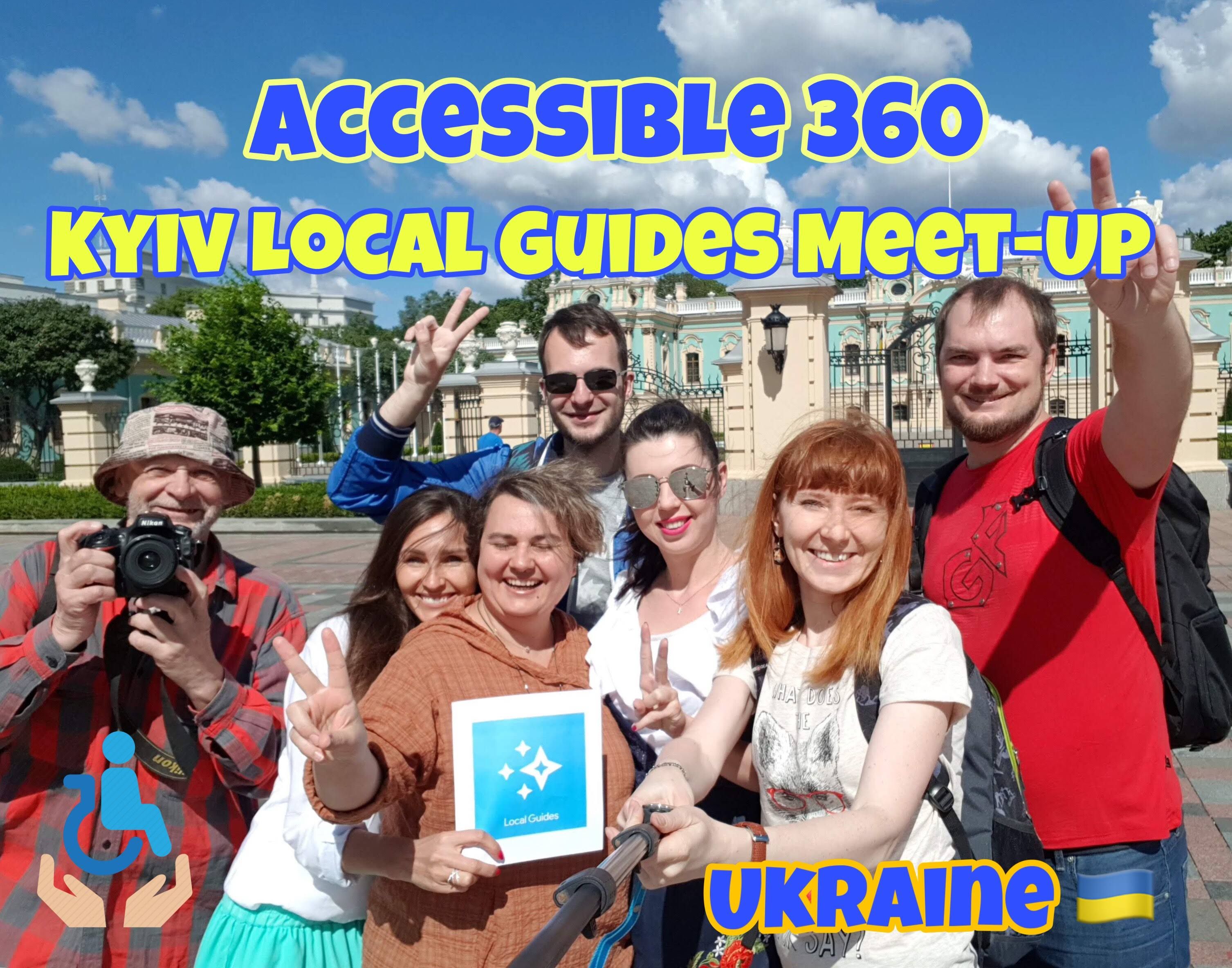 Caption: Selfie of Kyiv LG Meet-UP participants: @GLG_BVF, @UaValentine, @JuliaM, @nkiriljuk, @AnastasiaK, @RedCatZs and @AntonKuts with Mariinsky Palace, blue sky and beautiful clouds behind us, together with the name of the Meet-Up, Accessibility sign and logo of the Google LG (Kyiv LG Team)