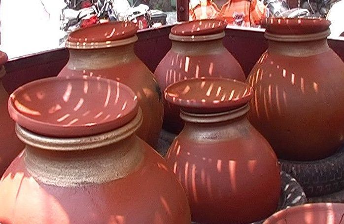 OR Earthen Pitcher is very common in India in summer season.