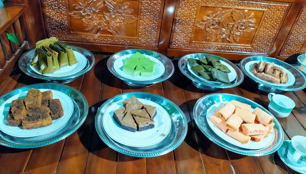 A photo of Some of the South Sulawesi desserts are served on stainless steel plates