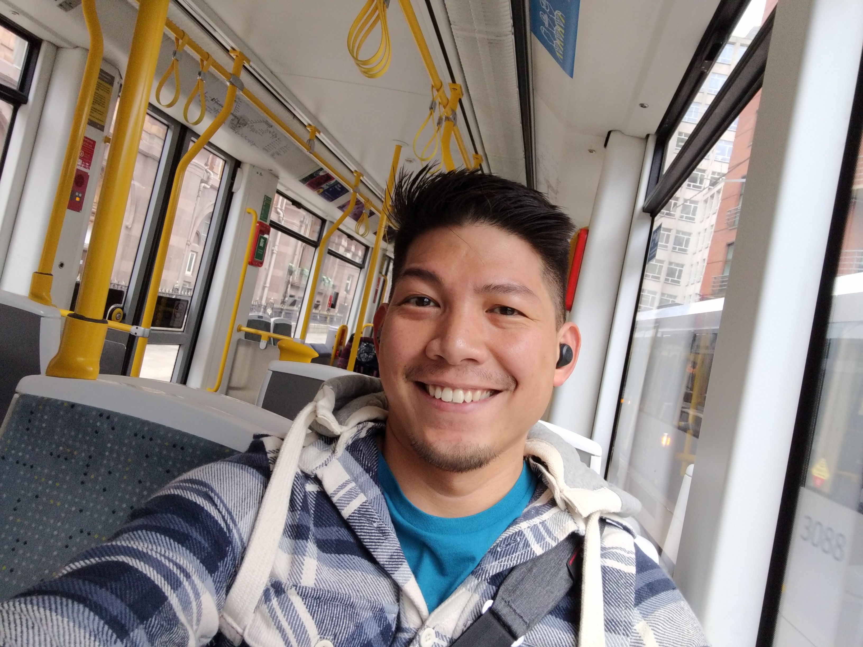 Caption: A photo of Local Guide @AdrianLunsong in the Manchester tram!