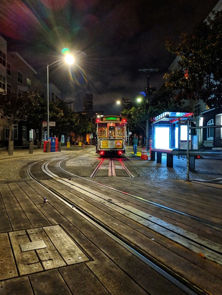 Caption: I took this picture of the trolley stop near our hotel at Connect Live, handheld with a mobile phone--using these tips.
