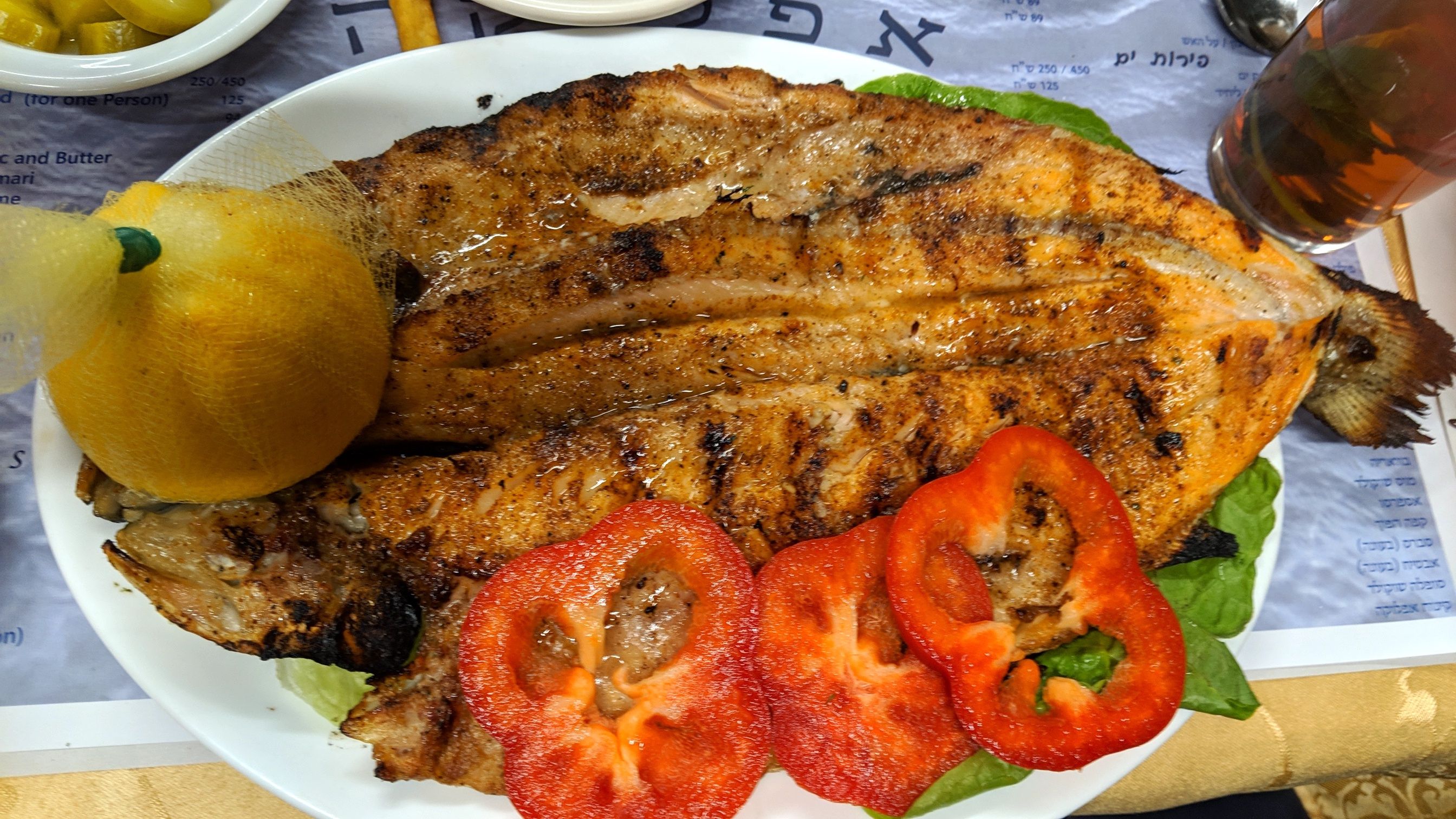 Whole fish spiced right and grilled perfectly in Israel
