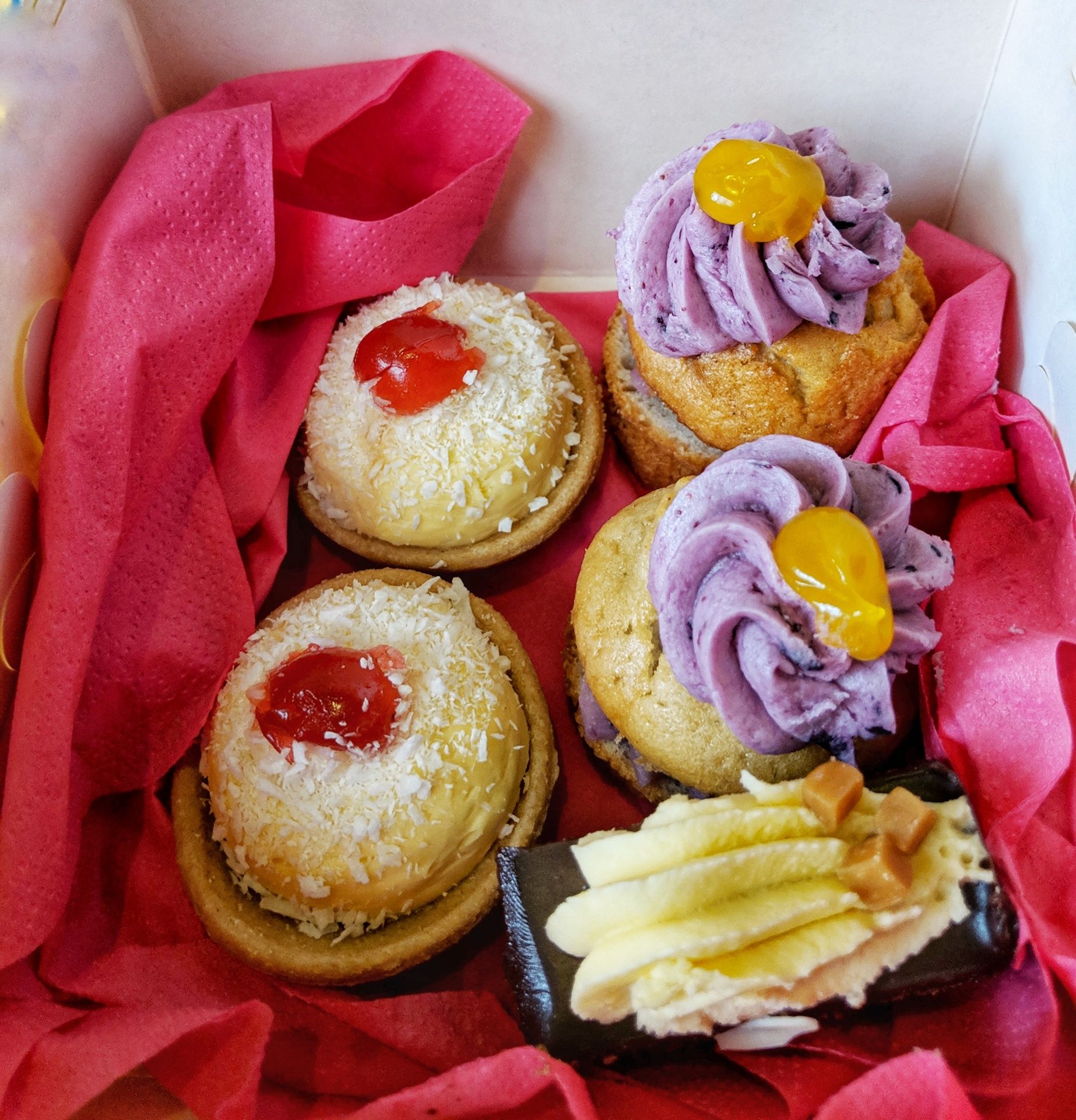 Cakes in a take out box. If you can't finish everything you can ask for it to be boxed up to eat later.