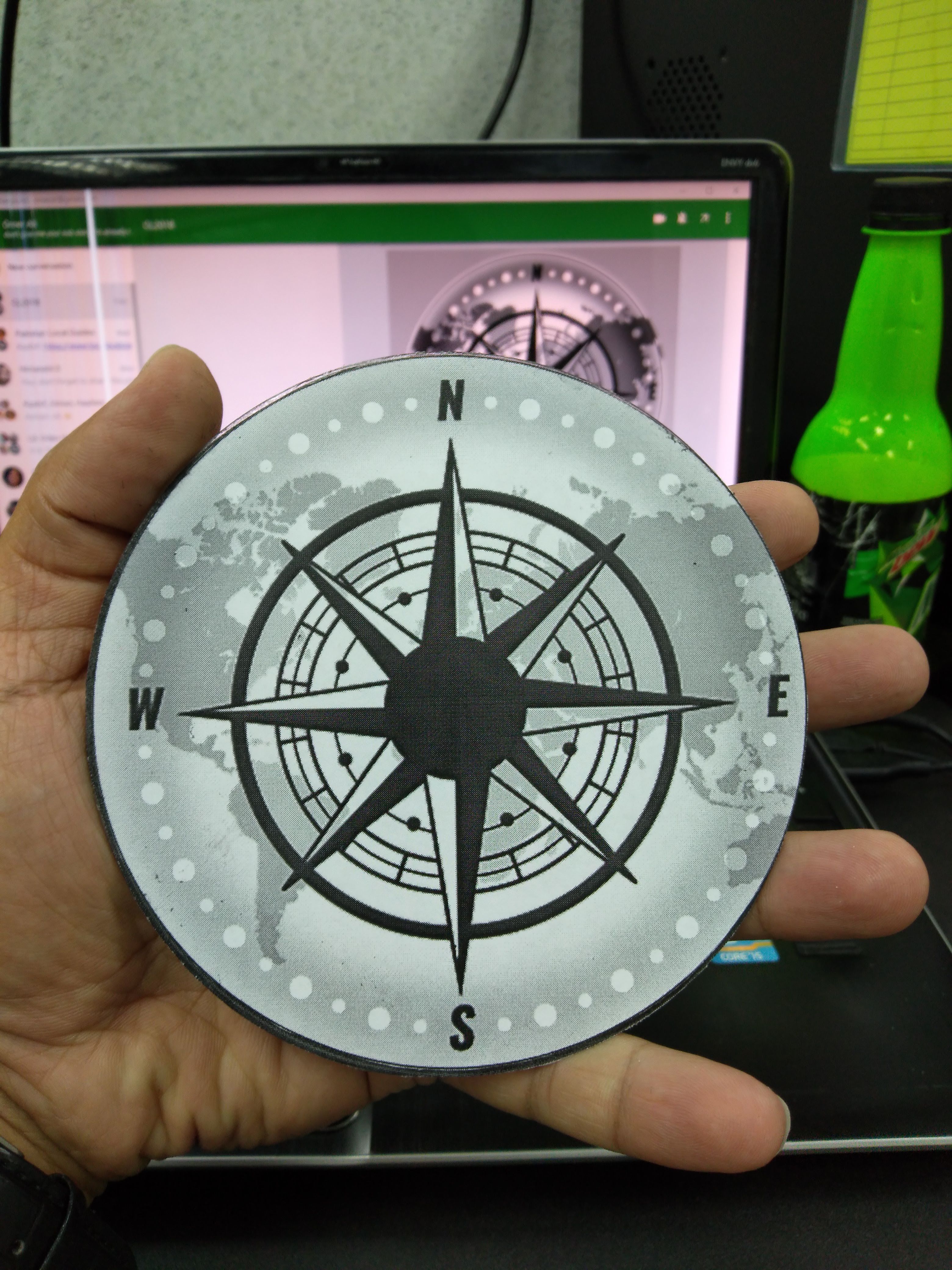 The compass design on the CD