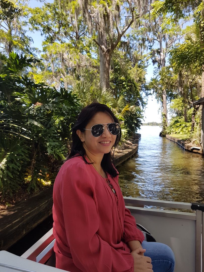 Caption:  A photo of Sonia wearing sunglasses while on a boat cruise over the chain of lakes in Winter Park, Florida, United States. (Local Guide @SoniaK)