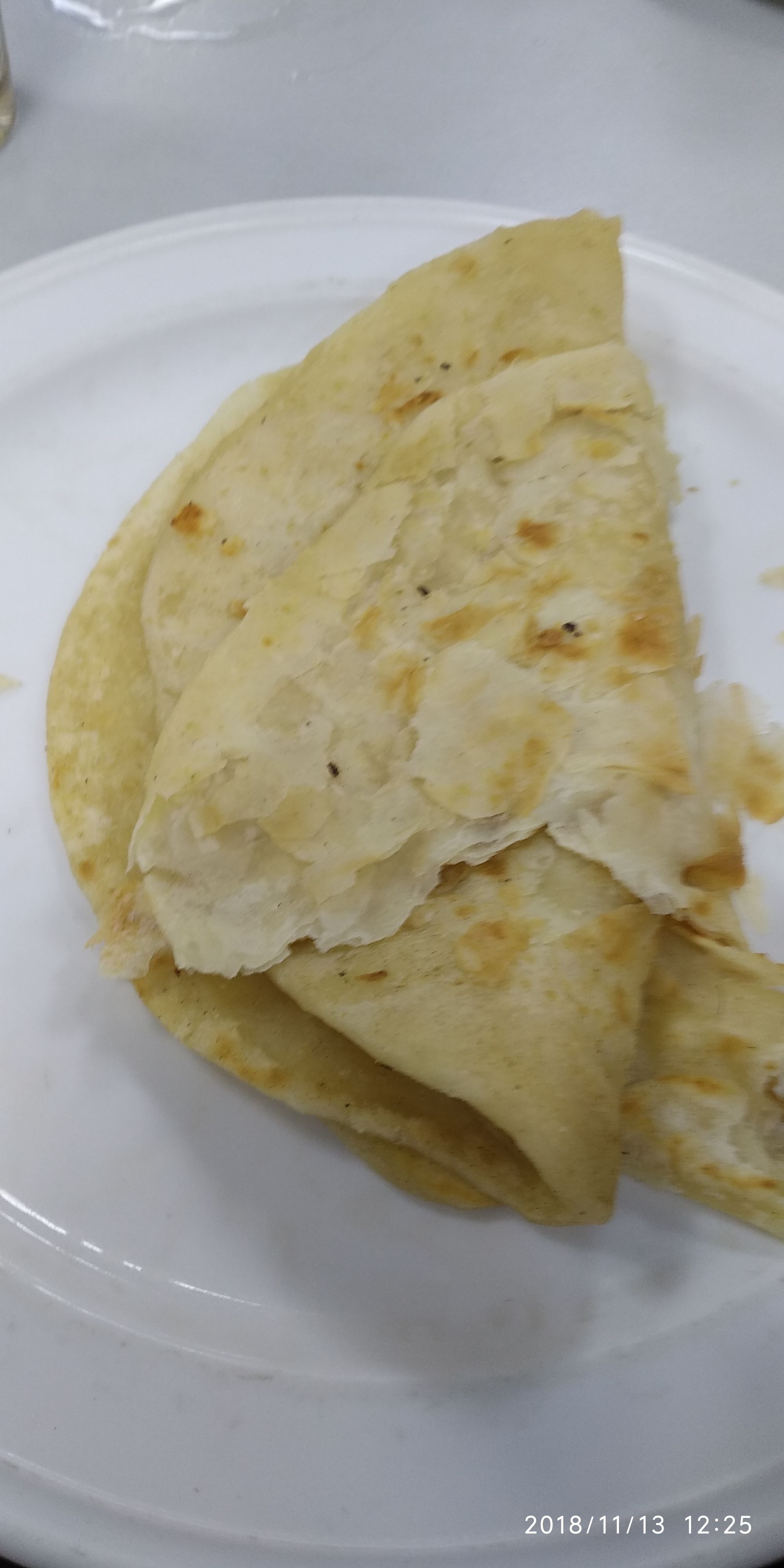 Paratha. Bdt 6 taka per piece.u can chose two tipe of paratha, one is oily and another one is non oily. Both are crispy and crunchy. It's prepared with flour and ghee.