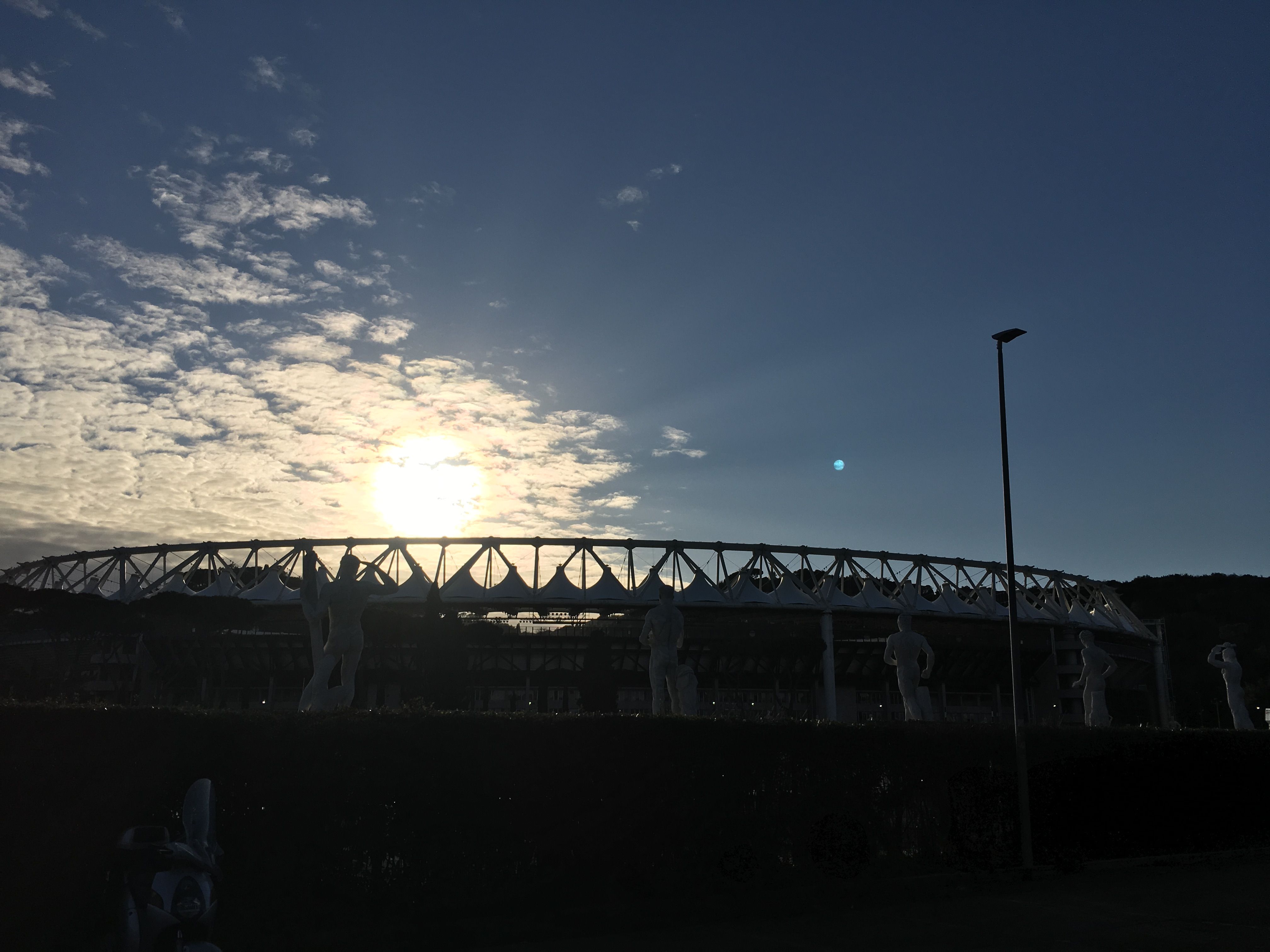 Caption: Sunset above Stadio Olimpico (Local Guide MashaPS)