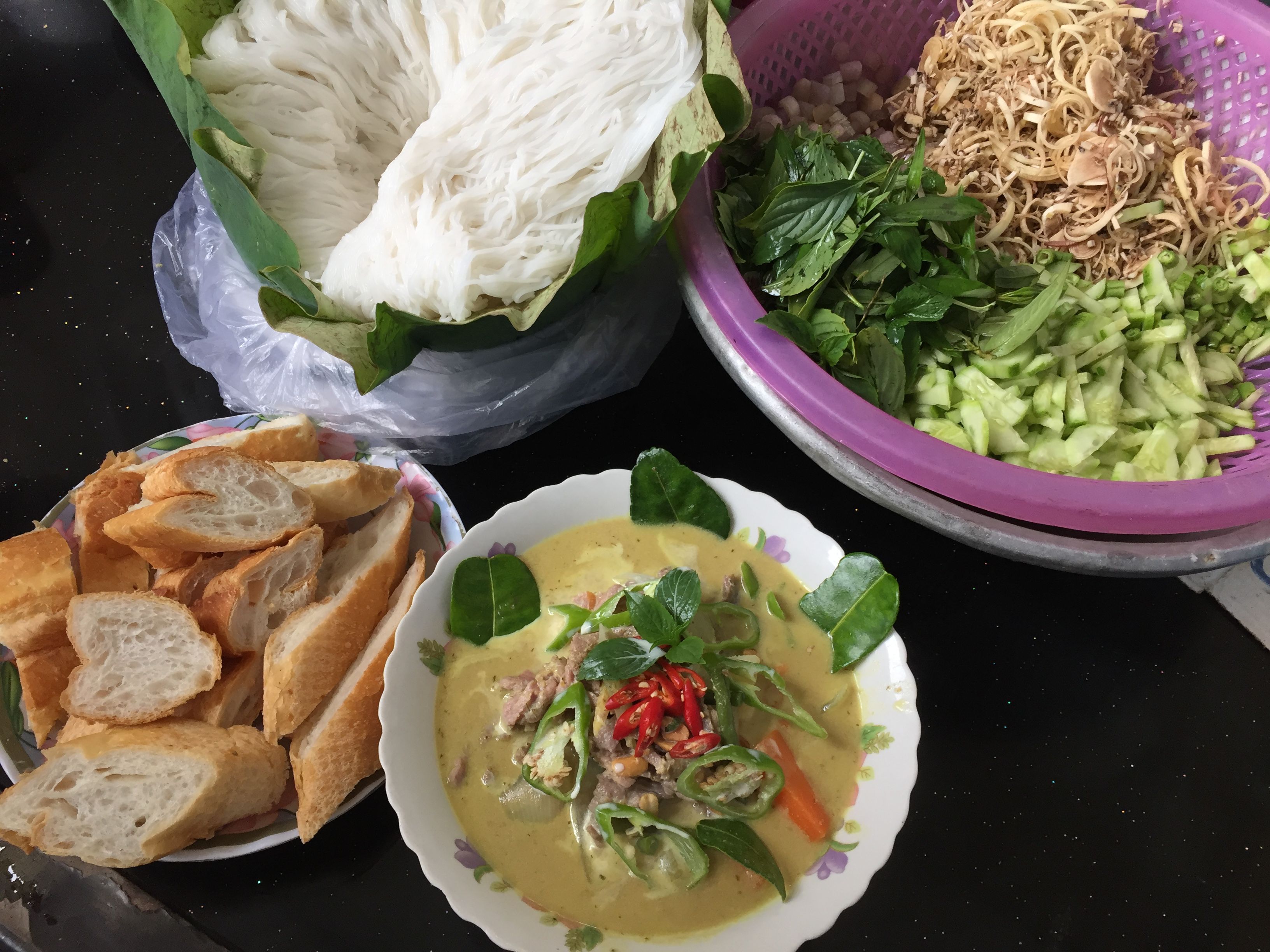 Num banh chok or Khmer noodle with beef curry