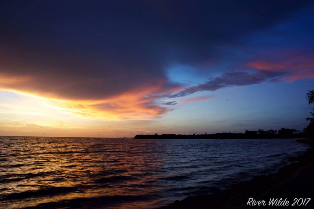 The line between good and evil... Sunrise on Placencia, Belize.