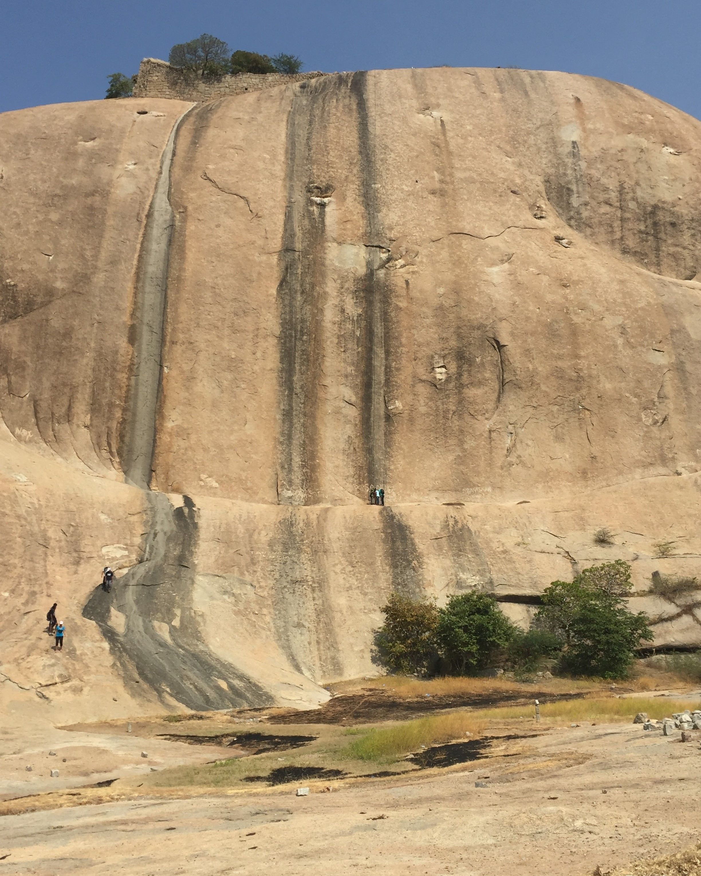 A photo of the 300ft rapelling rock at Bhongir Fort