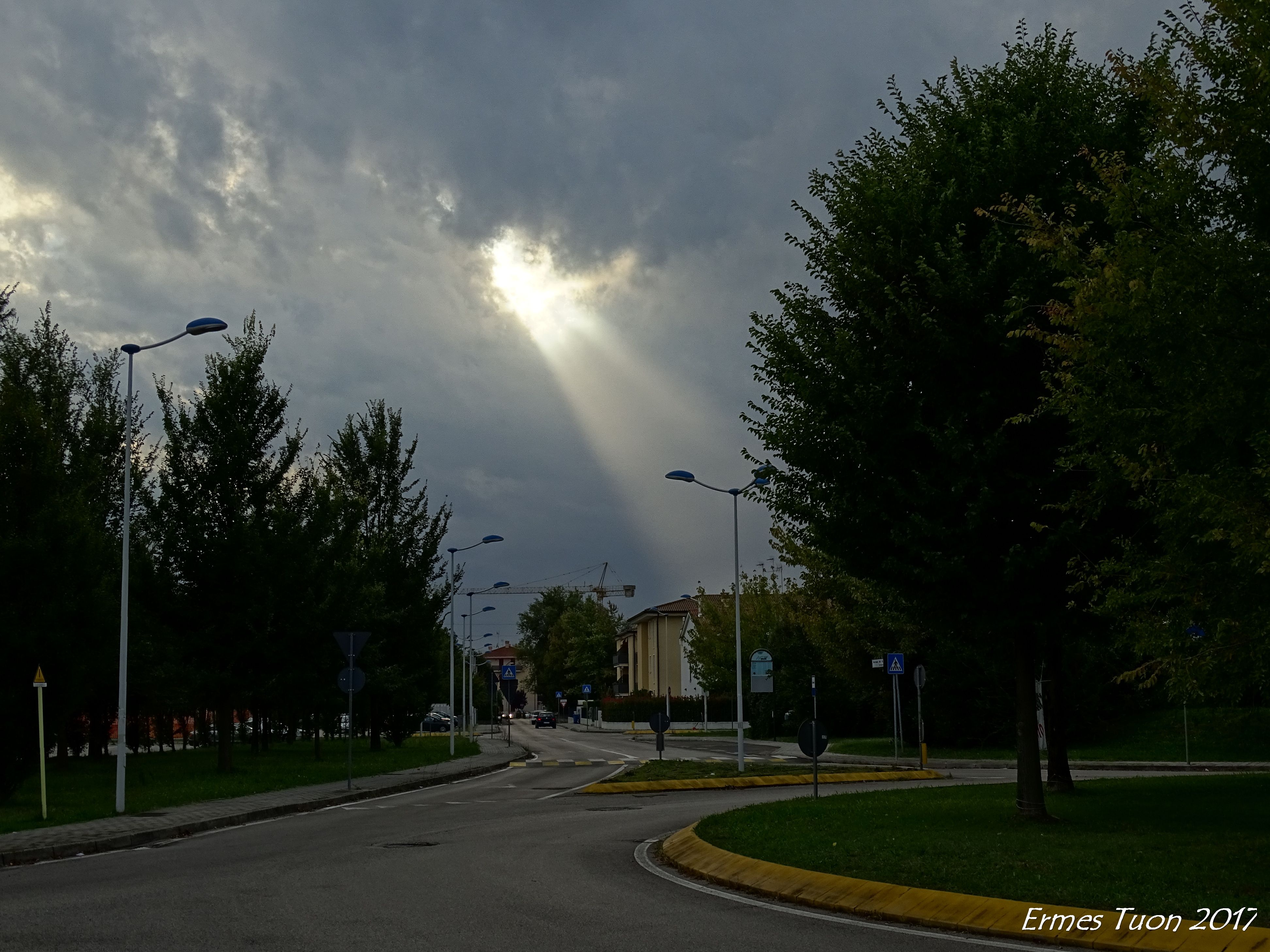 Caption: A ray of sun is trepassiong the clouds, after an heavy rain -  Local Guide @ermest