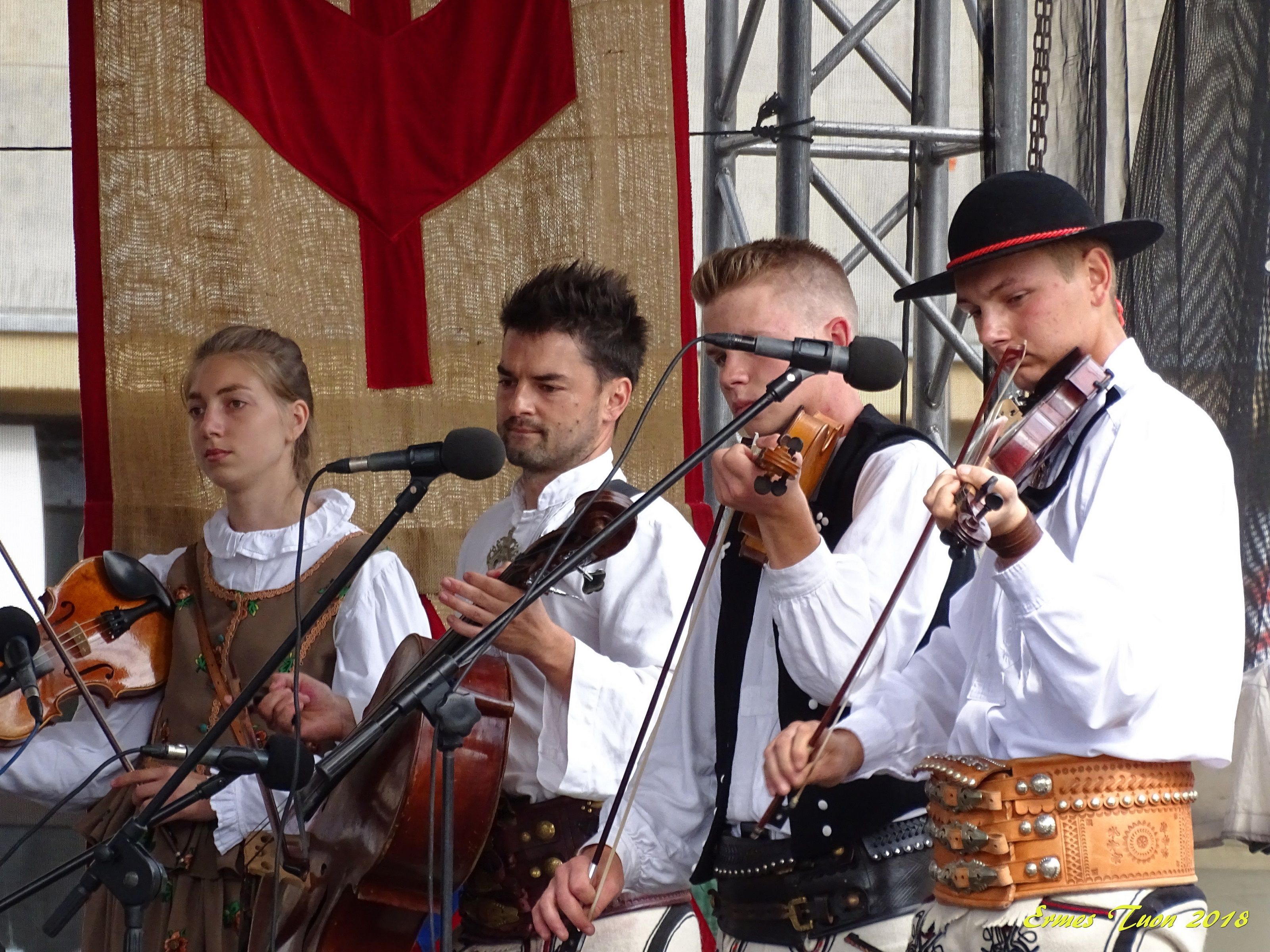 Caption - Folk music played in the street market - Krakow, Poland