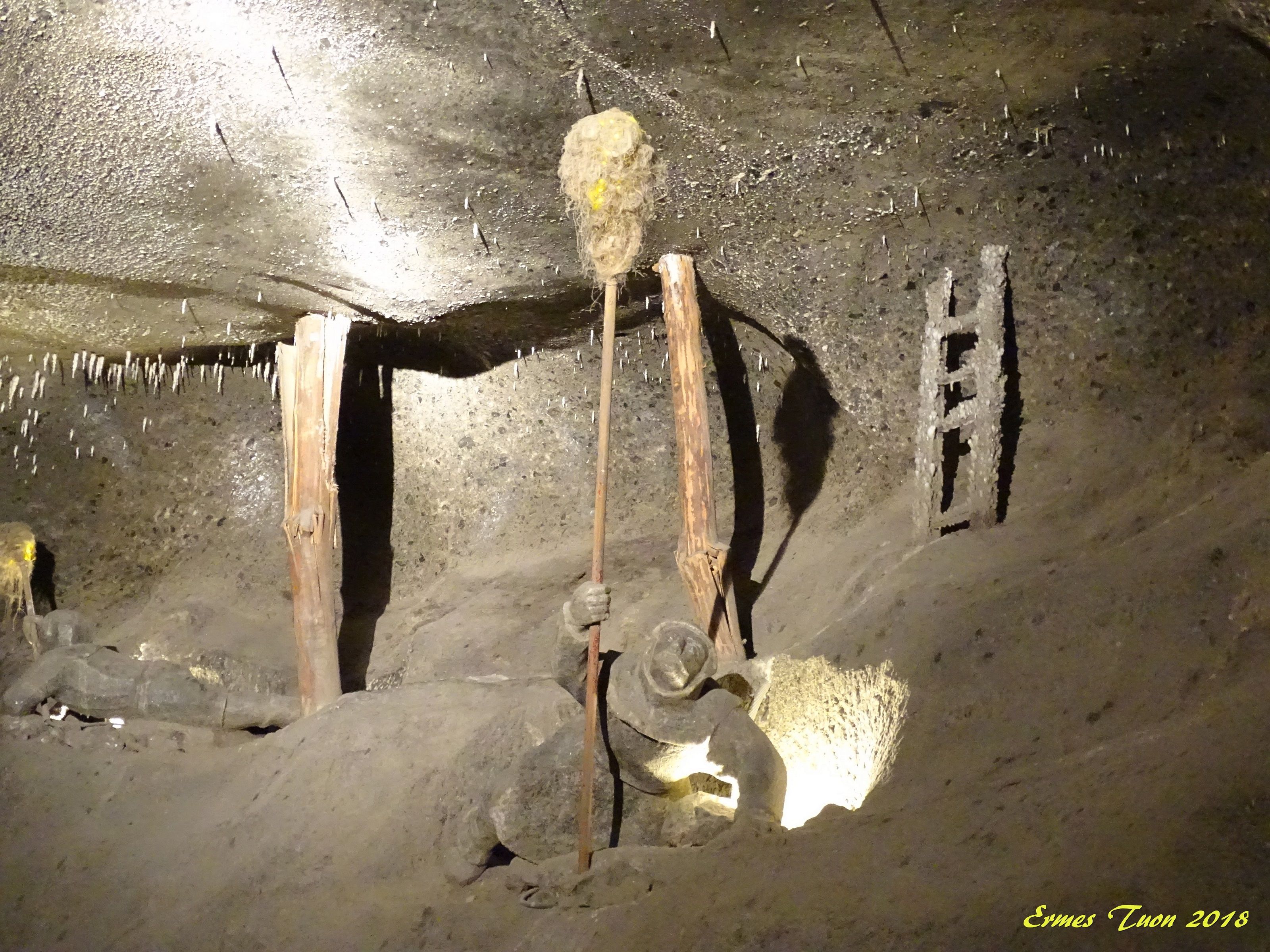 Caption: a miner illuminates the cave  -  historical representation of the work in the mine - Photo: Local Guide @ermest