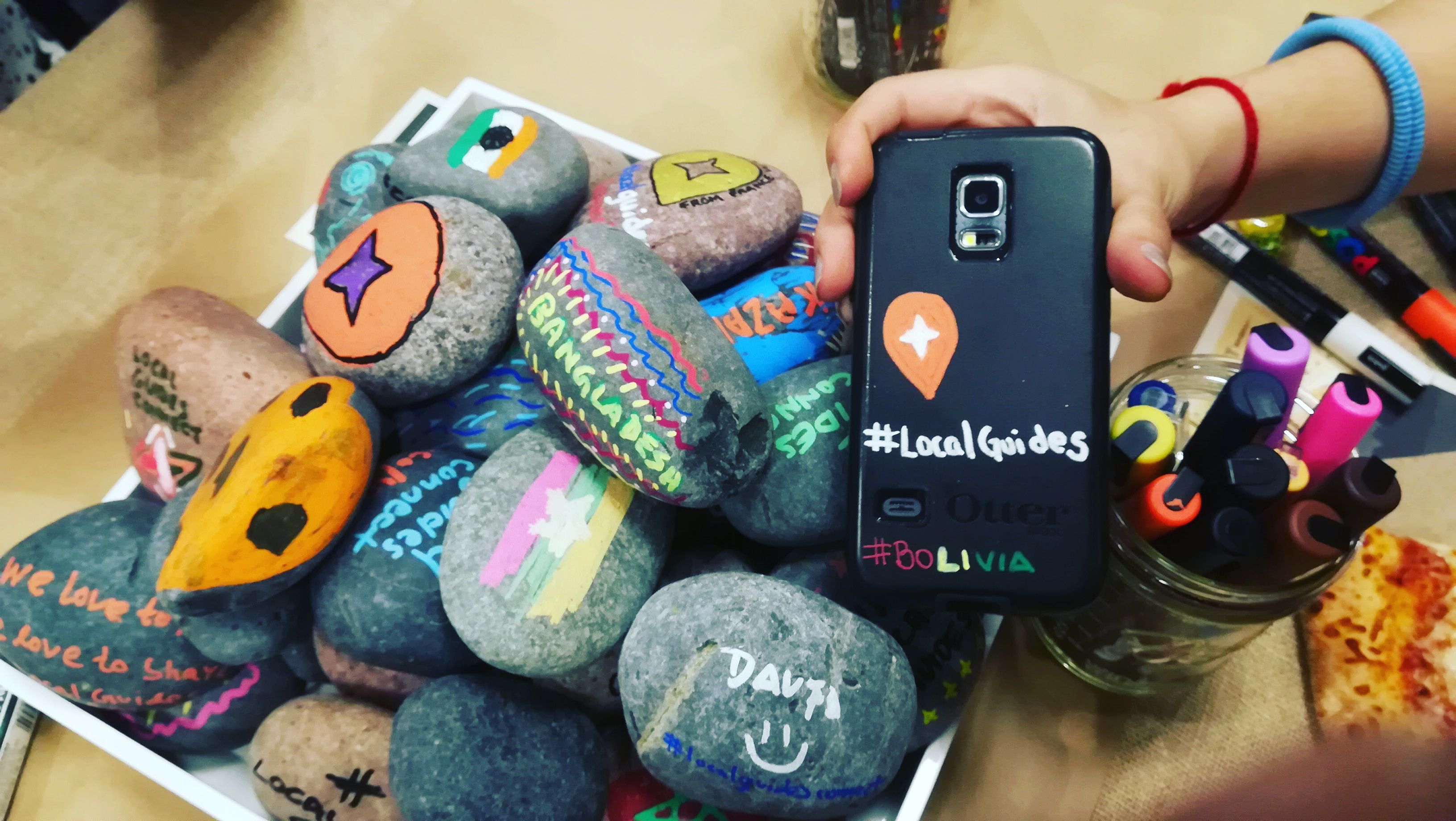 Caption: painted stones at Connect Live Lounge