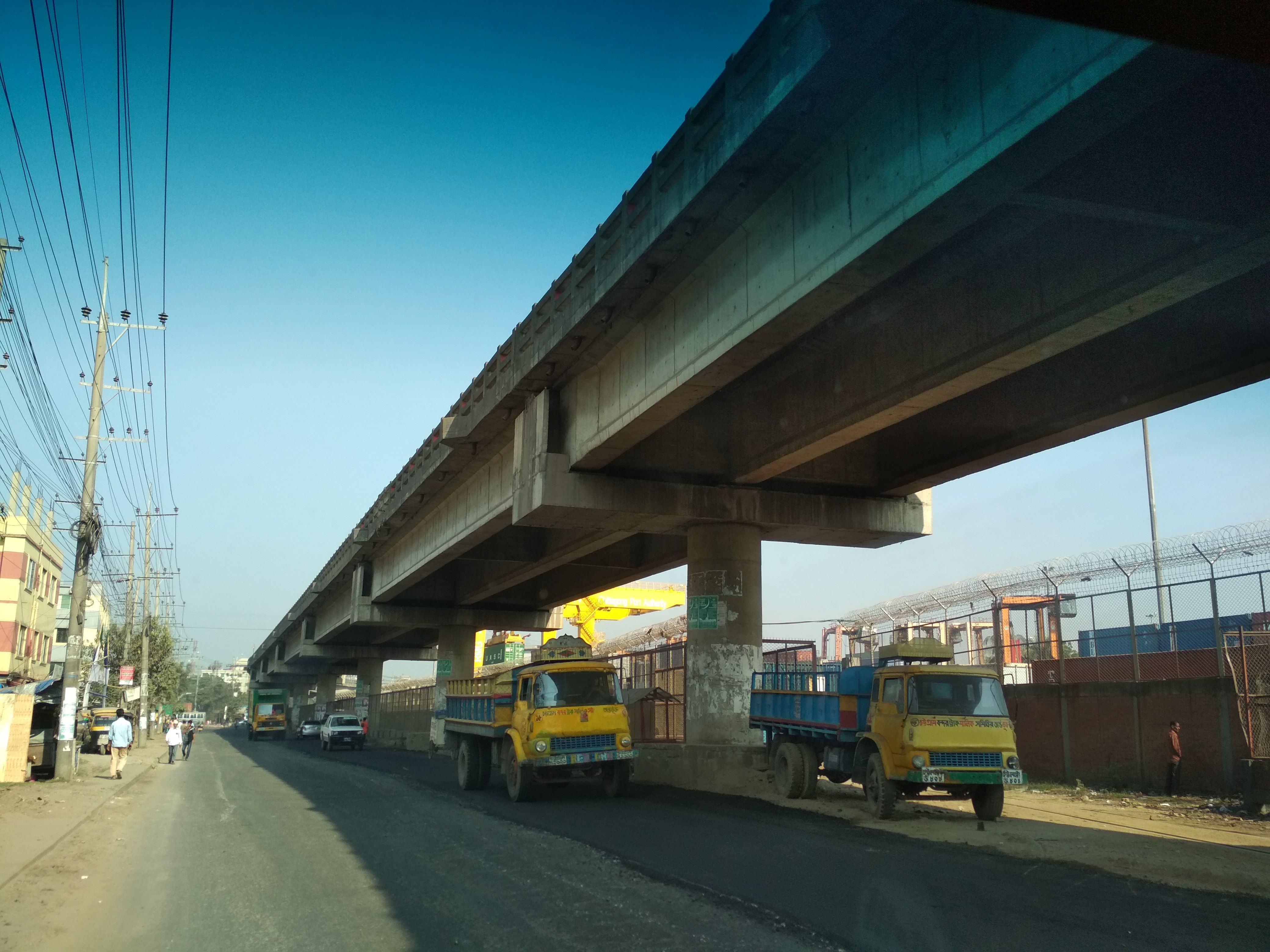 Port link road fly over connecting  Chittagong container terminal to Port link road. All container carrier, Covered van abd trucks entering and leaving uses/follows this fly over. This fly over reduced traffic on M A Aziz road by which general transports are running..