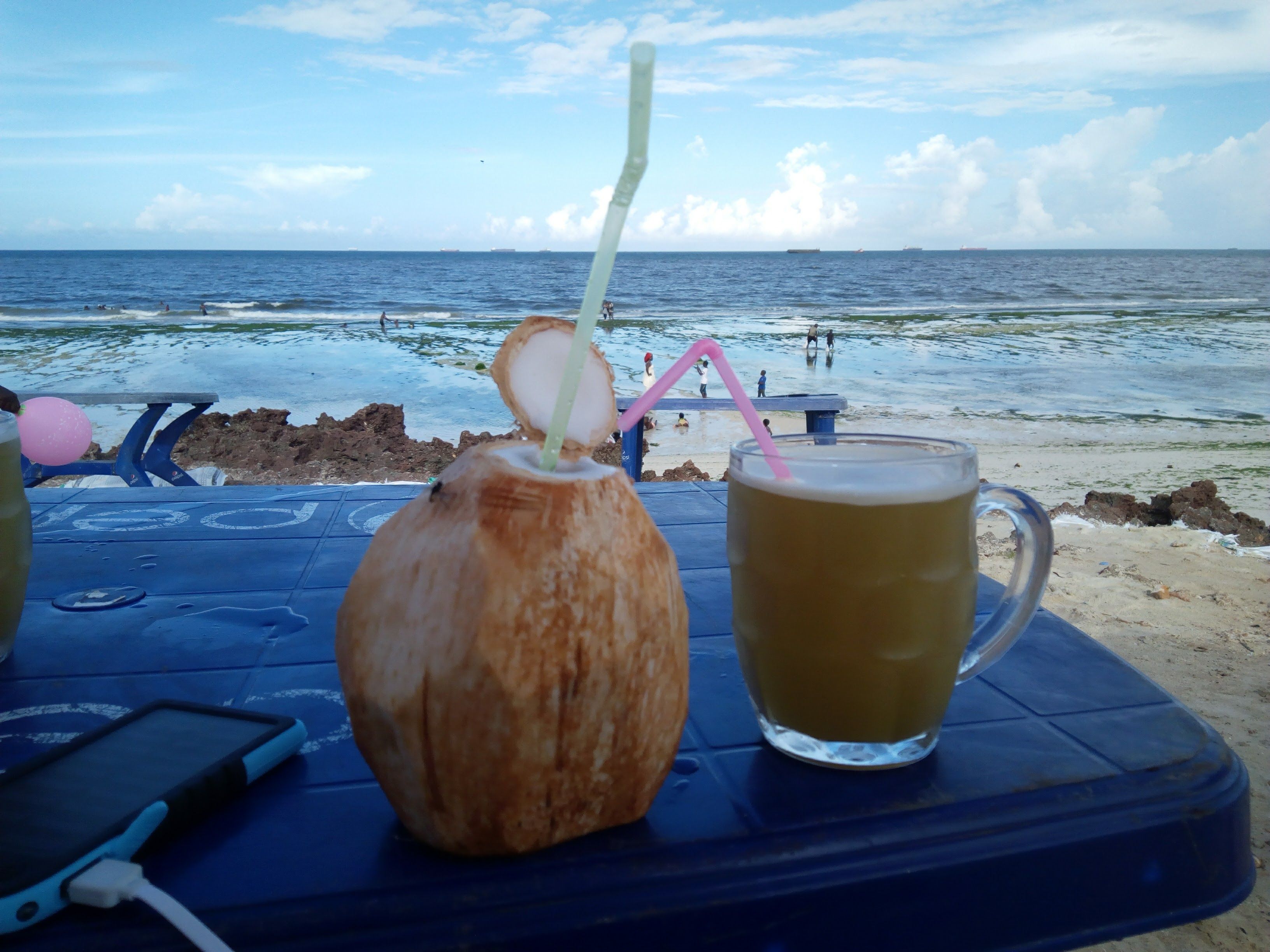 Sugarcane juice and coconut drink at Coco beach