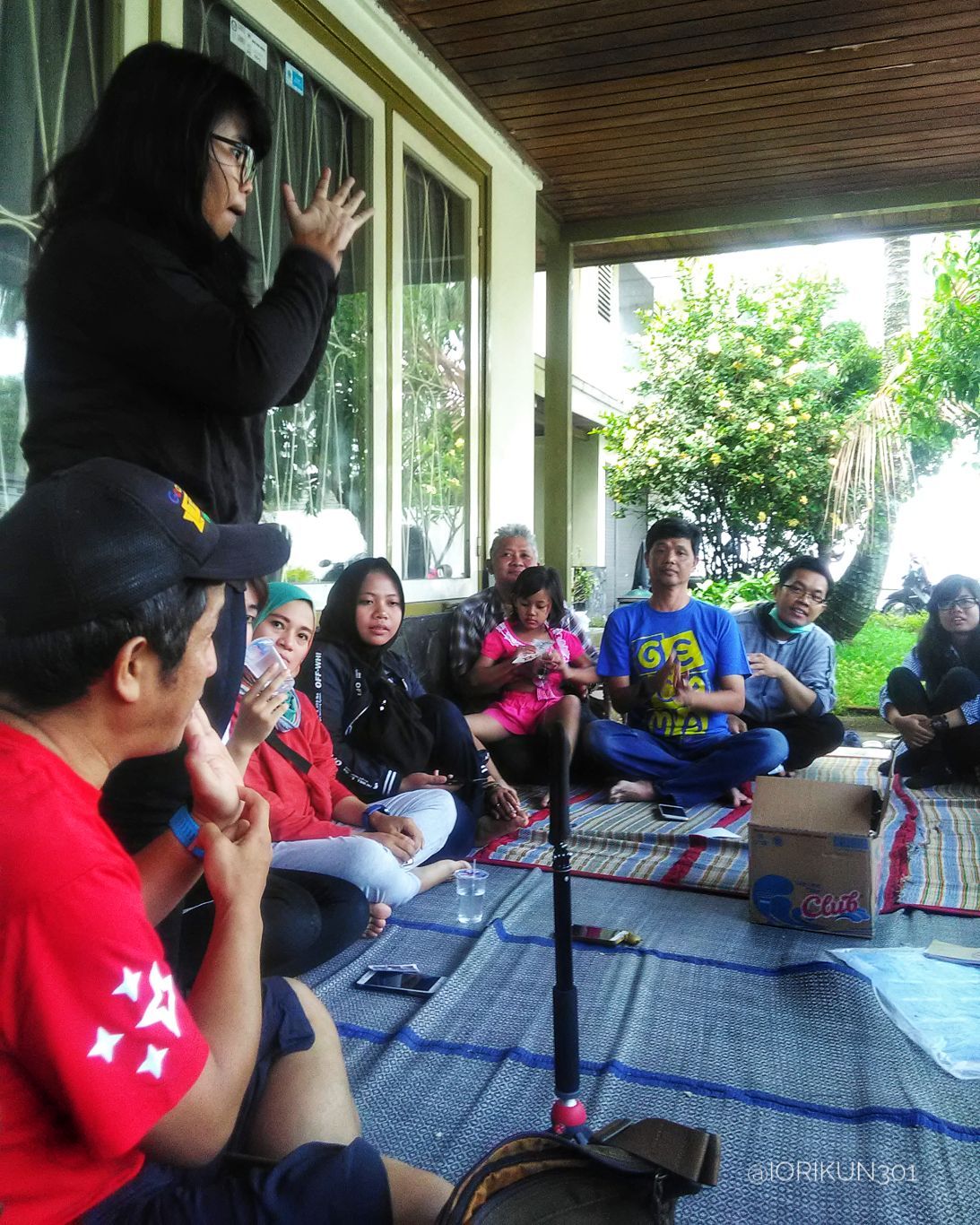 Mr. Brian (far left) explain how to use Google Maps while translated into Indonesian Sign Language by ms. Yanda (left standing)