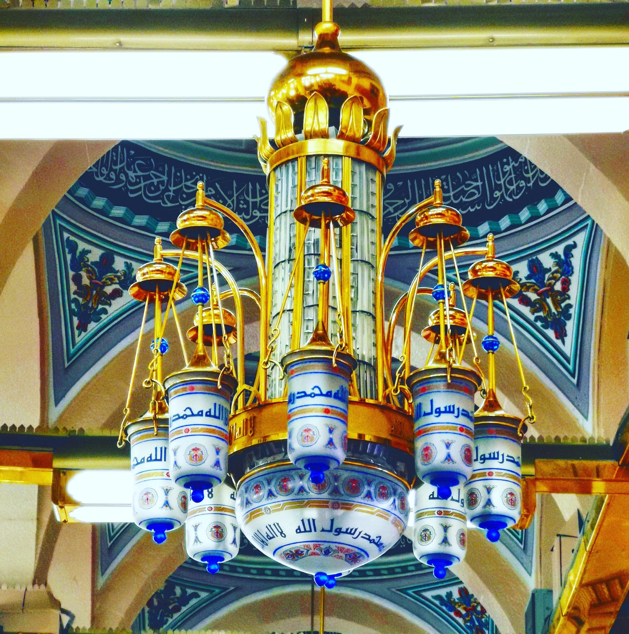 Giant Islamic chandeliers in the roof of the mosque.