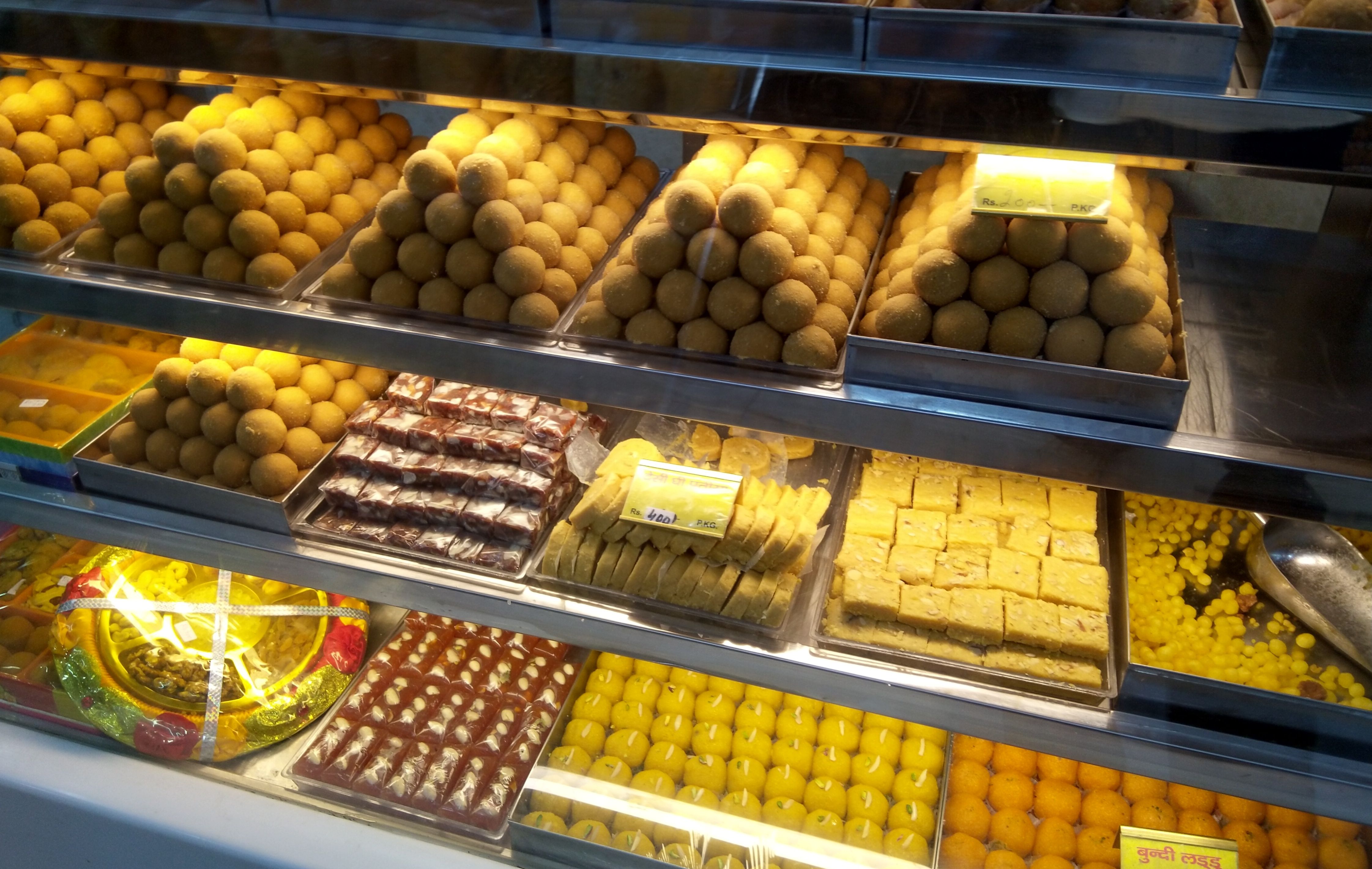 Different types of Laddoos besan(gram flour), boondi, patisa. Laddoos are the king of sweets.for every occasion we say laddoo bantiye  distribute the laddoos.