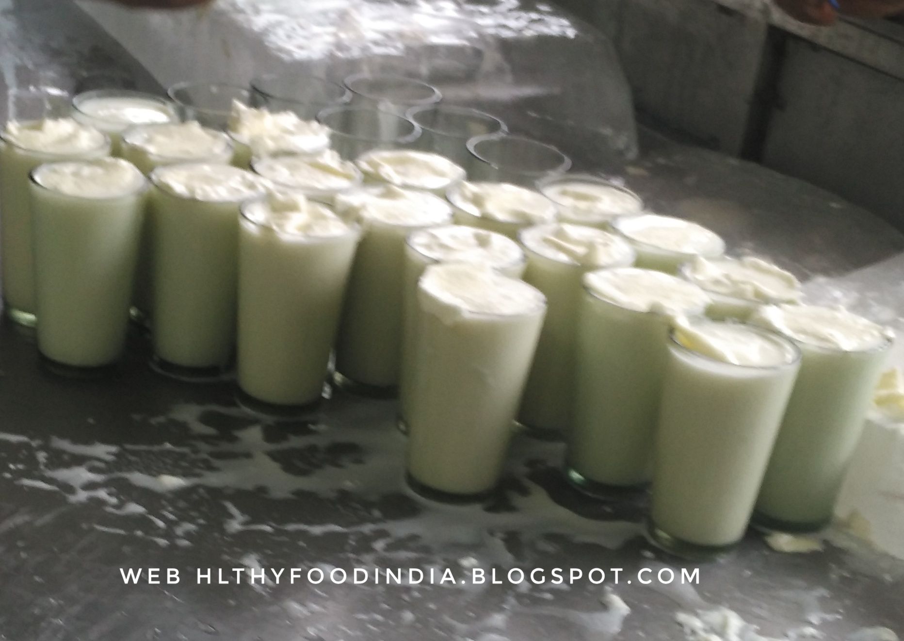 This is sweet diluted curd served chilled, called lassi in here