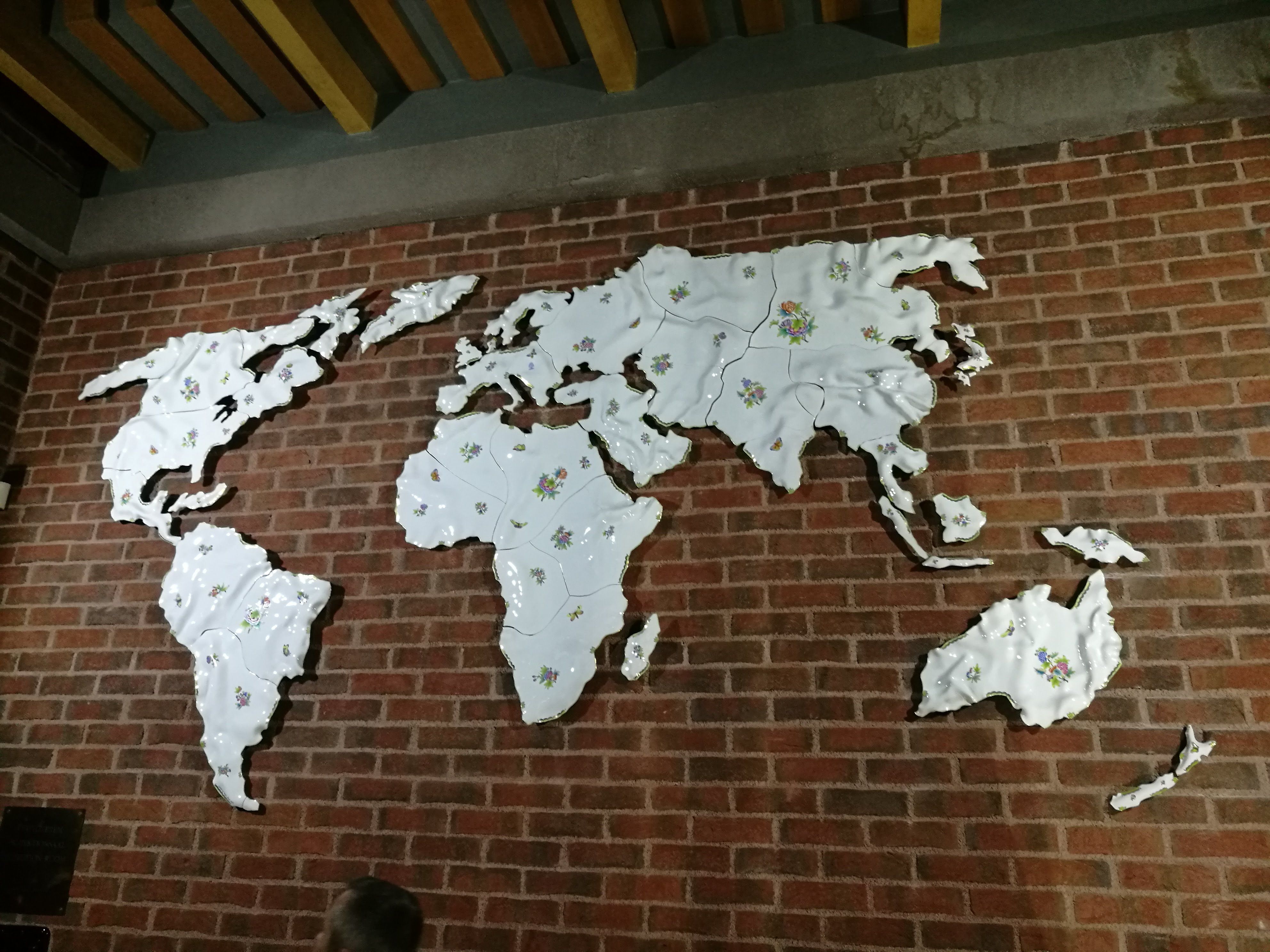 The world map made of hand crafted and painted porcelain elements in the Herend Porcelain Manufacture, Hungary