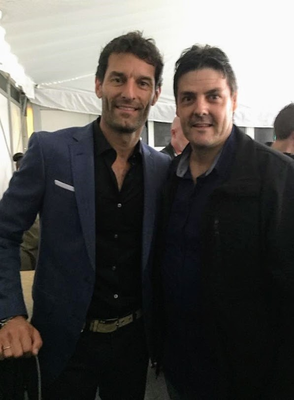 Caption: @adamGT's cousin with Mark Webber at the 2018 Australian F1 Grand Prix