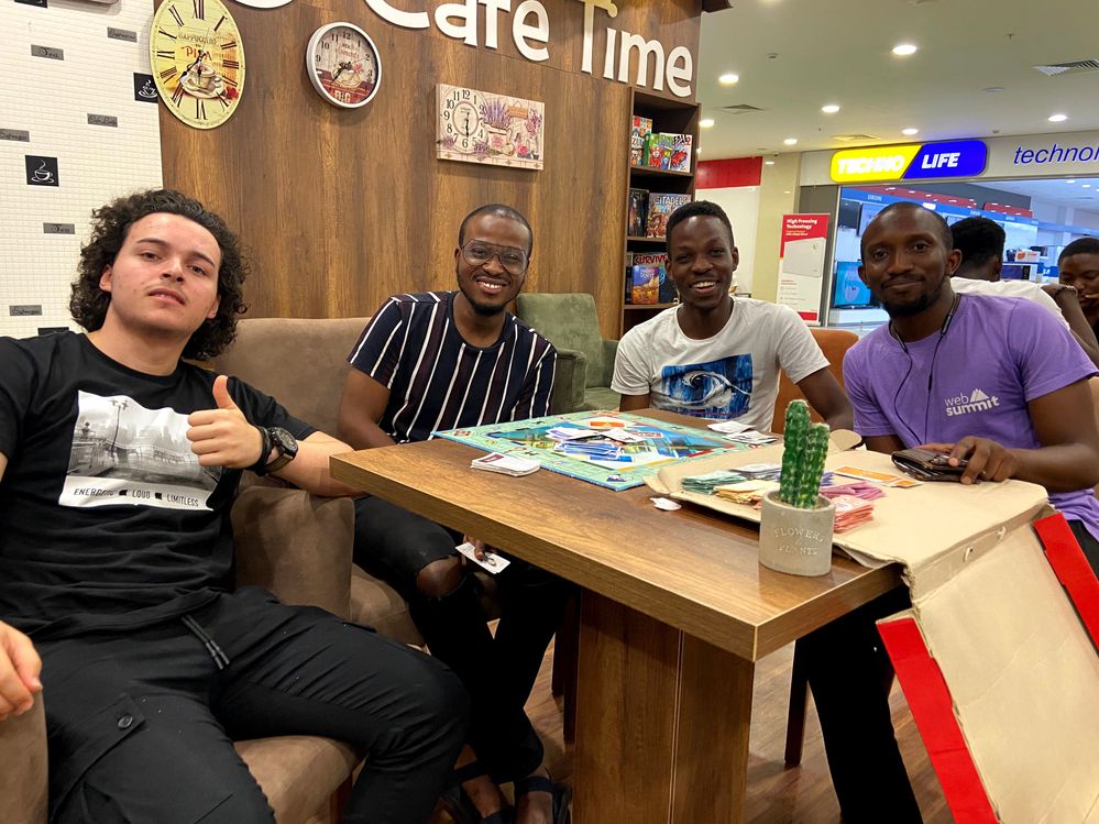Caption: A photo of Local Guides Ryad from Libya, Daniel and Kehinde from Nigeria, and Alpha (from left to right) during their first accessibility meet-up at the City Mall in Famagusta, Cyprus. (Courtesy of Local Guide @Alffiiy)