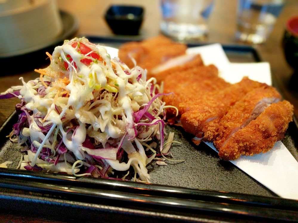 Chicken katsu with a hearty serving of salad.