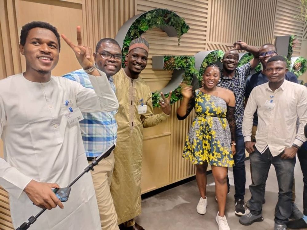Caption: @Nuhuu, @Shola_, @Uceey, and other local guides all around @sagir for a photo at Google office yesterday.